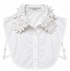 White button-front ladies dickey with large embroidered floral collar details and side torso adjustable straps, shown on a plain white background. The neck label reads The Curated Collar.